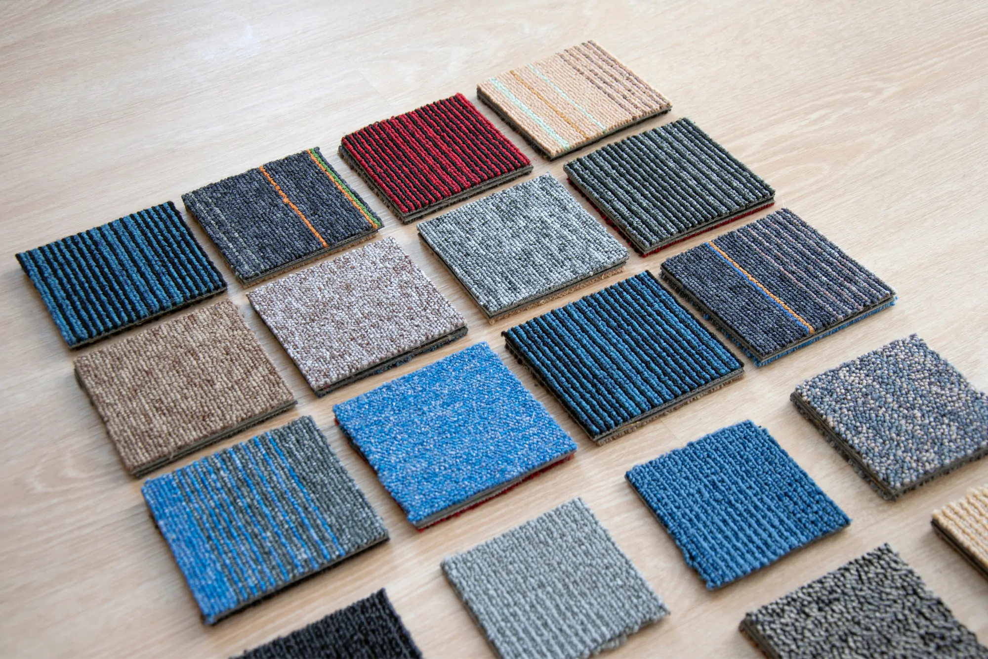 Samples of different Carpet Tiles patterns and Colours